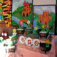 Still life of flowers and plates with flower painted on them